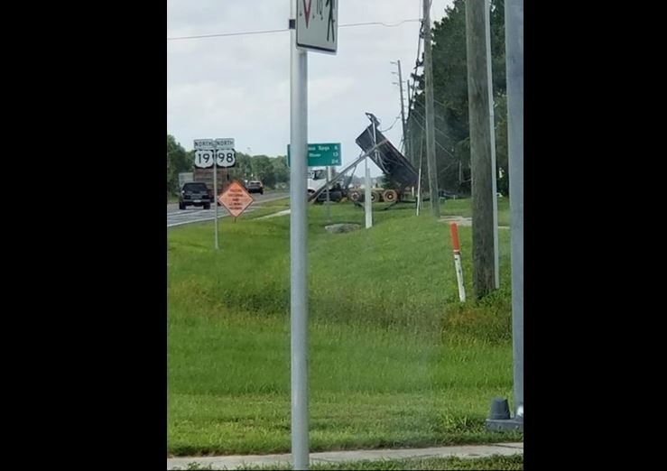 dump truck, power lines, sugarmill woods, citrus gazette